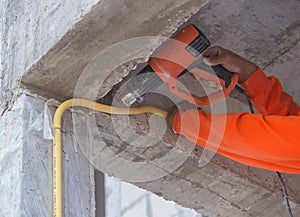 Hand use a heat gun to bending electric PVC pipe