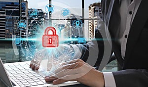 Hand use laptop computer with padlock icon