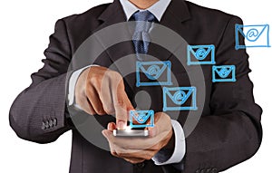 Hand use smart phone computer with email icon