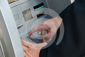 Hand Using Keypad Atm Machine