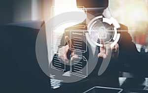 Hand using laptop and touch folder of document Management System, online documentation database and process automation to efficien