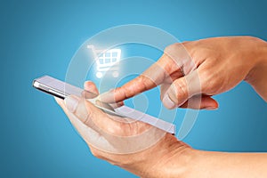 Hand using mobile phone online shopping, business and ecommerce concept.