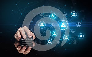 Hand using mouse with human networking concept