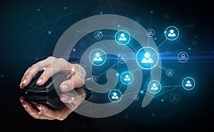 Hand using mouse with human networking concept