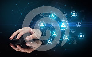Hand using mouse with human networking concept