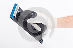 Hand using plastering trowel