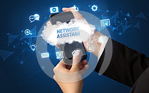 Hand using smartphone with cloud technology concept