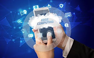 Hand using smartphone with cloud technology concept