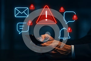 Hand using smartphone with digital warning alerts, cybersecurity risk, data breach, online threats, privacy protection concept.