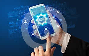 Hand using smartphone with technology concept