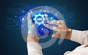 Hand using smartphone with technology concept