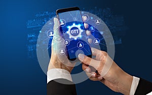 Hand using smartphone with technology concept