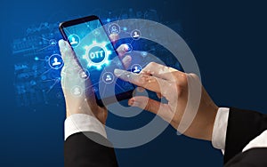 Hand using smartphone with technology concept