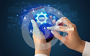 Hand using smartphone with technology concept