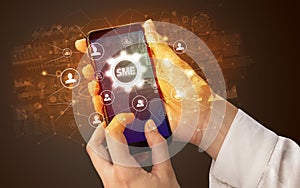 Hand using smartphone with technology concept