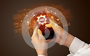 Hand using smartphone with technology concept