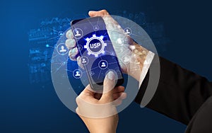 Hand using smartphone with technology concept