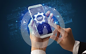 Hand using smartphone with technology concept