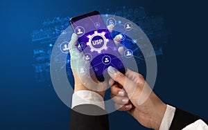 Hand using smartphone with technology concept