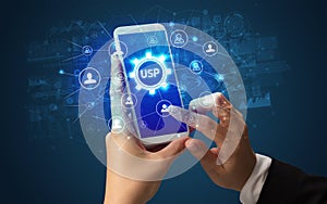 Hand using smartphone with technology concept