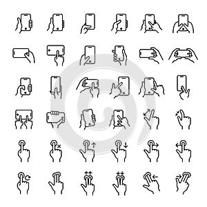 Hand using smartphone touch screen 36 outline icons