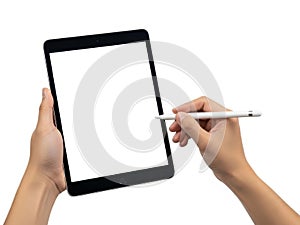 Hand using stylus on tablet screen