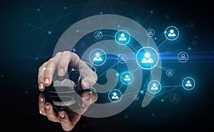 Hand using mouse with human networking concept