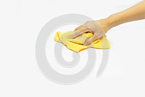 Hand Using yellow rags wipe on isolated. photo