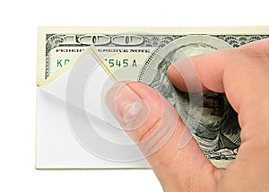 Hand and wad of paper