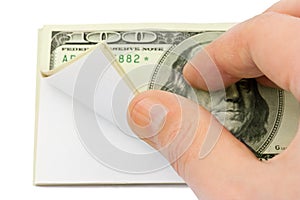 Hand and wad of paper