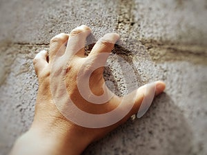 hand on the wall