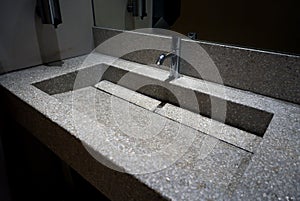 Hand wash basin granit worktop . photo