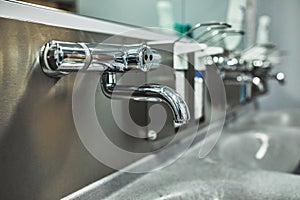 Hand wash room in the hospital. Modern preoperative room for disinfection of disinfection of doctors before surgery