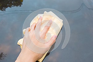 Hand Washing Car with Yellow Chamois microfiber towel