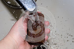 Hand washing process. A tap with water and a bar of soap.