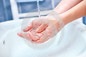 Hand washing under runnig water