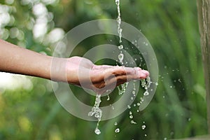 Hand water drop scene