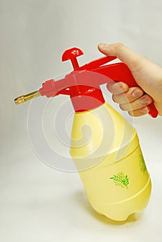 Hand with watering can