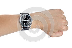 A hand wearing a black wrist watch