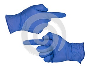 Hand wearing blue nitrile examination glove makes a pointing left or right gesture