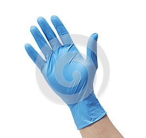 Hand wearing nitrile gloves on white background