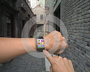 Hand wearing ultra slim bent interface smartwatch with apps