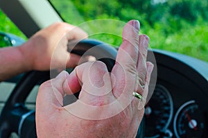 Hand on the wheel, sign OK