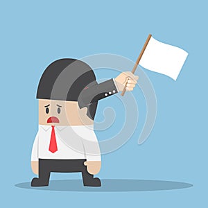 Hand with white flag sticking out from businessman head