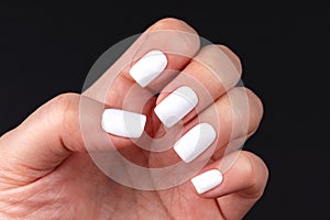 Hand with white nails