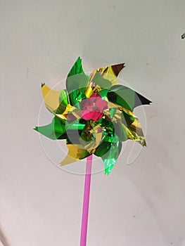 Hand windmill plastic toy.rainbow colour.