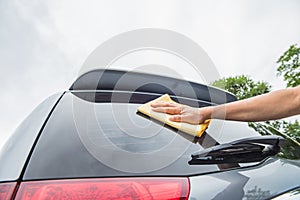 Hand wipe cleaning car glass