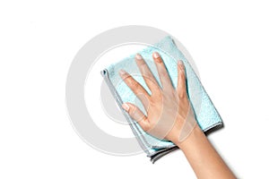 Hand wiping surface with blue rag isolated on white