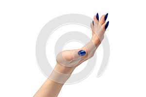 Hand of a woman with blue nails isolated on a white background