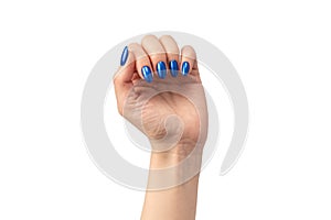 Hand of a woman with blue nails isolated on a white background